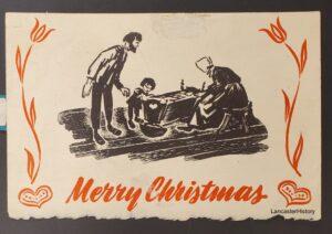 Pen and ink Christmas card featuring an Amish family around a cradle.
