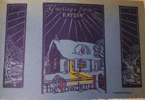 Christmas card with house covered in snow.