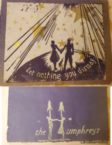 Two people holding hands with gold stars in background.